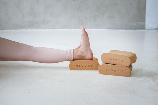 Ergonomic yoga block. 100% sustainable cork material.